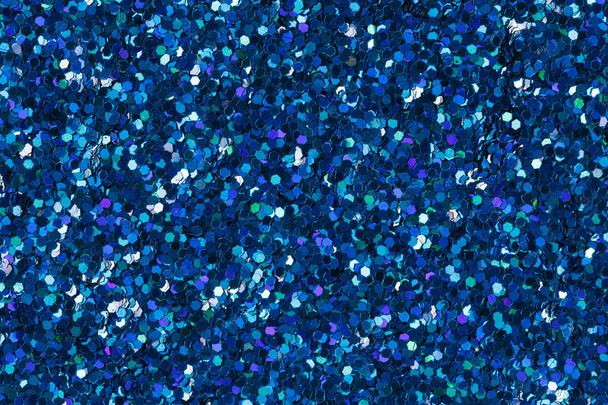 Ragyogó kék csillogás háttér. Sötétkék csillogás textúra. Nagyfelbontású fénykép. - Fotó, kép