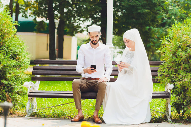 National wedding. Bride and groom. Wedding muslim couple during the marriage ceremony. Muslim marriage. - 写真・画像