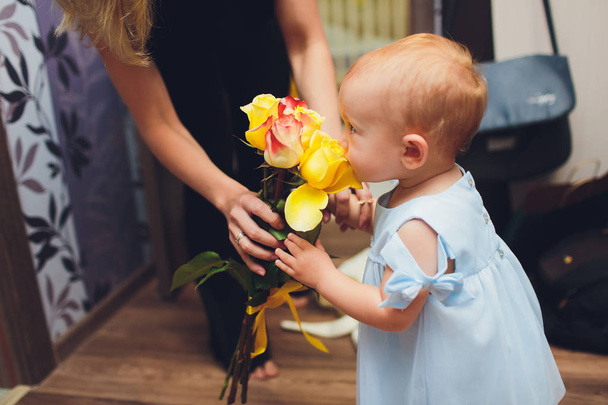 the happy little baby girl in white dress smile indoor. - Foto, Imagen