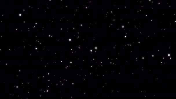 Shimmering particles flowing in space, sparkly dust on black background  - Footage, Video