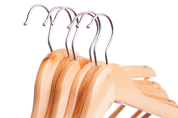 Some wooden hangers in raw isolated - Photo, Image