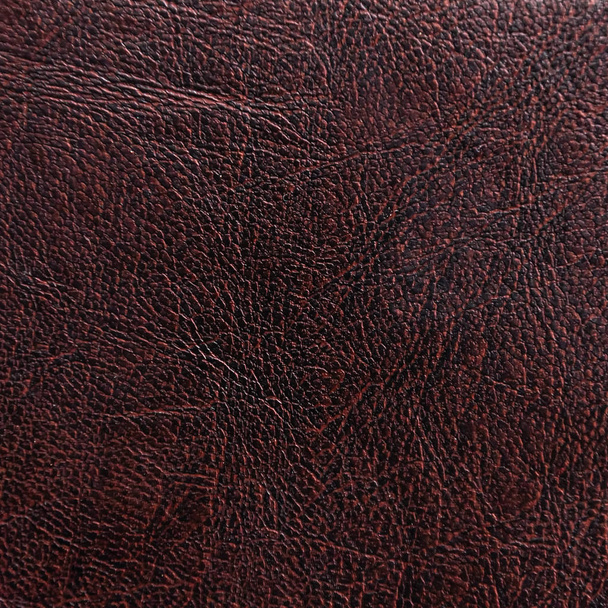 Текстура изделия из кожи темно-красного цвета
 - Фото, изображение