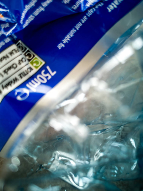 This batch number is part of the second recall by the FSAI for bottled water due to above normal arsenic levels - Foto, Imagen