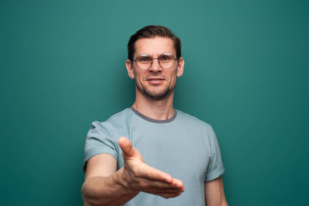 Portrait of a positive young man in glasses - Fotografie, Obrázek
