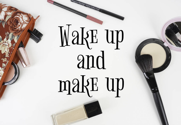 a quote with cosmetics concept over white background, wake up and make up - Zdjęcie, obraz
