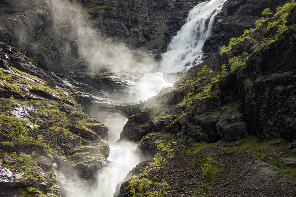 Trollstigen waterfall on serpentine mountain road, Norway - Fotografie, Obrázek