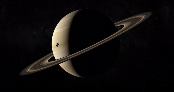 Satelita przestrzenny orbitujący wokół planety Saturn - Materiał filmowy, wideo