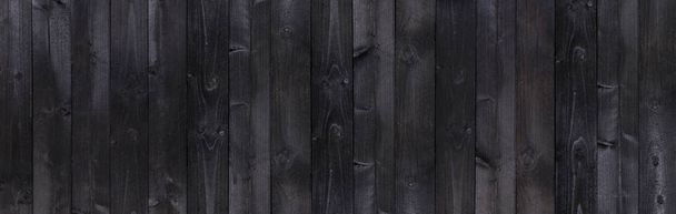 Wide black wooden background, old wooden planks texture - Foto, afbeelding