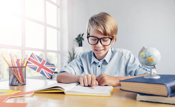 Smart Teenager Boy Learning English - Photo, Image