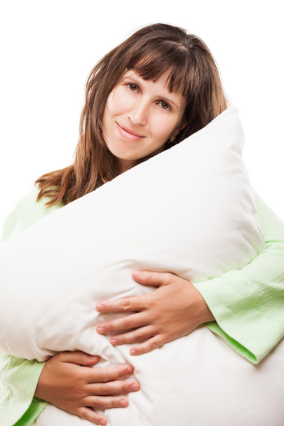 Beauty smiling woman holding pillow for rest and sleep - Photo, image