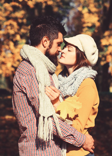 Girl and bearded guy or happy lovers on date kiss - Fotografie, Obrázek