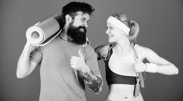 Healthy lifestyle concept. Man and woman with yoga mat and sport equipment. Fitness exercises. Workout and fitness. Girl and guy live healthy life. Fitness class. Keeping those muscles flexible - Fotoğraf, Görsel