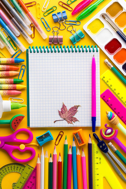 School notebook and various stationery. Back to school concept. - Photo, Image