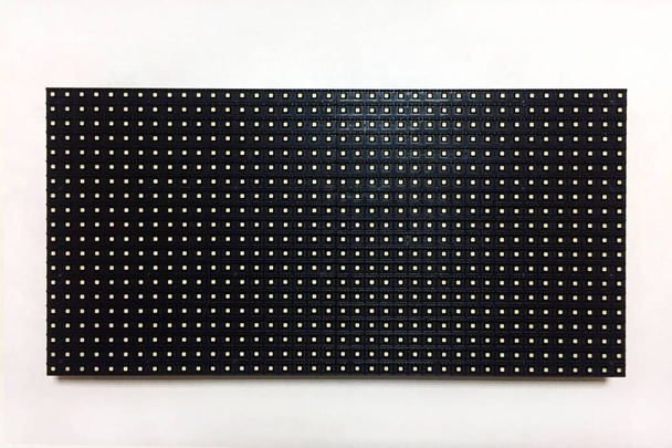 LED module for the manufacture of LED screens and scoreboards on a white background. Components for illuminated advertising. Close-up. - Photo, Image