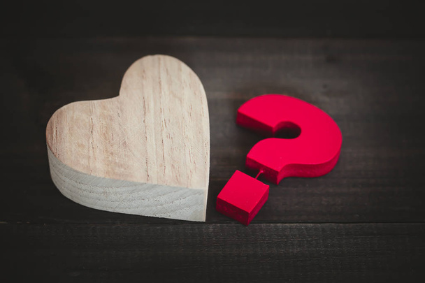 Wooden heart with Red Question mark , Problem concept - Fotó, kép