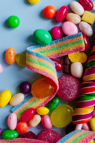 A lot of colorful candy and sweets - Фото, изображение