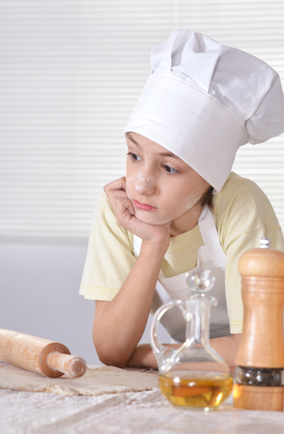 boy in a chef's hat - Фото, изображение