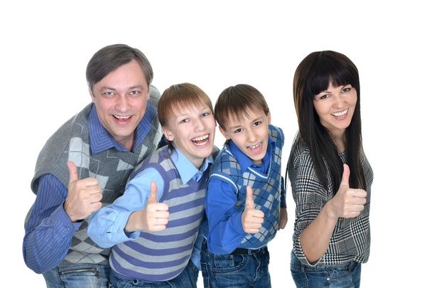 Portrait of cheerful family of four - 写真・画像