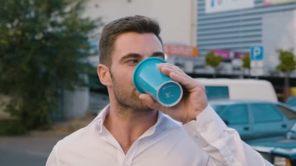 Portrait of Handsome Man Drinking Delicious Coffee in City Urban Lifestyle. Successful Businessman employee looking at camera. - Metraje, vídeo