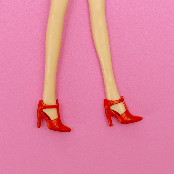 Doll legs in stylish shoes.  Girl love shoes concept - Foto, Imagen
