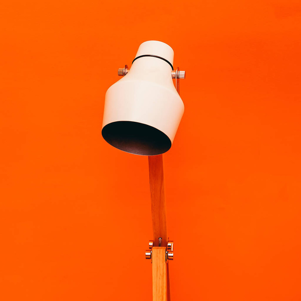Vintage lamp on an orange background. Minimal - Foto, afbeelding