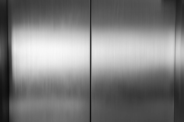 Металл двери лифта, текстура из нержавеющей стали
 - Фото, изображение