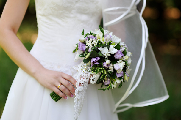 beautiful wedding bouquet at bride's hands - Foto, Imagem