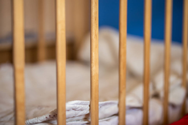 Baby cot, rods of crib, without child - Φωτογραφία, εικόνα