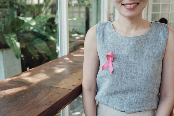 Asian women with pink ribbon, breast cancer awareness, October p - Fotoğraf, Görsel