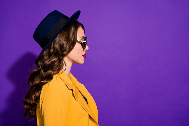 Profile photo of amazing lady look empty space wear stylish hat yellow costume isolated purple background - Foto, Imagem