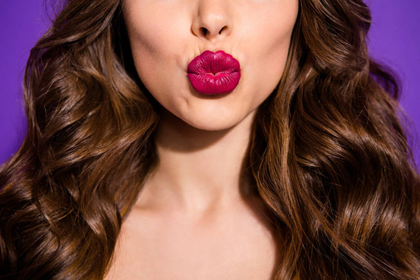 Cropped photo of girl lips pouted sending you kiss while isolated with purple background - Fotoğraf, Görsel