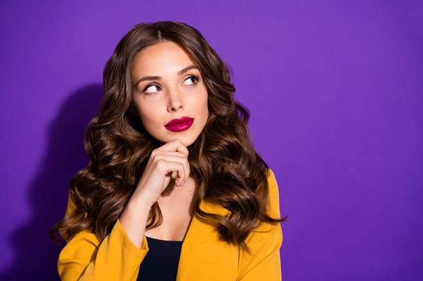 Photo of pensive pondering attractive woman planning development of her company isolated with purple background - Foto, afbeelding