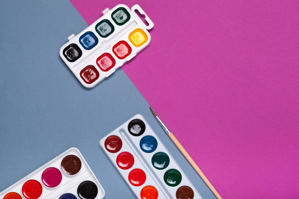 Art Palette with Colorful Paints Close Up top View - Фото, изображение