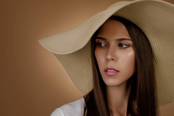young woman in fashionable summer hat - Fotó, kép