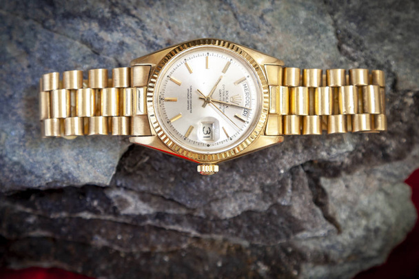 Rolex Oyster Perpetual Day-Date watch on stone background - Foto, Imagem