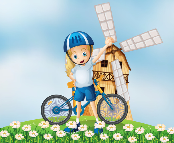 A female biker standing at the hilltop with a windmill - Vector, Image