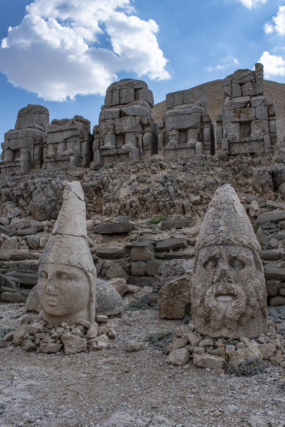Turkey: the east terrace of Nemrut Dagi, Mount Nemrut, where in 62 BCE King Antiochus I Theos of Commagene built a tomb-sanctuary flanked by huge statues of himself and Greek, Armenian and Median gods - Photo, Image