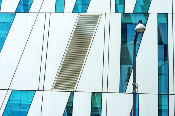 Facade of a glass building. Close-up. Architecture. Backgrounds. - Photo, Image