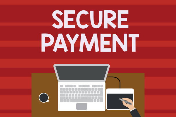 Text sign showing Secure Payment. Conceptual photo Security of Payment refers to ensure of paid even in dispute Upper view laptop wooden desk worker drawing tablet coffee cup office. - Photo, Image