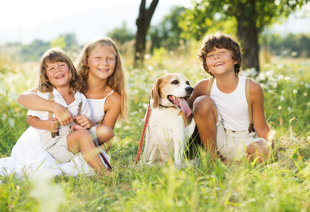 Happy kids with dog - Fotografie, Obrázek