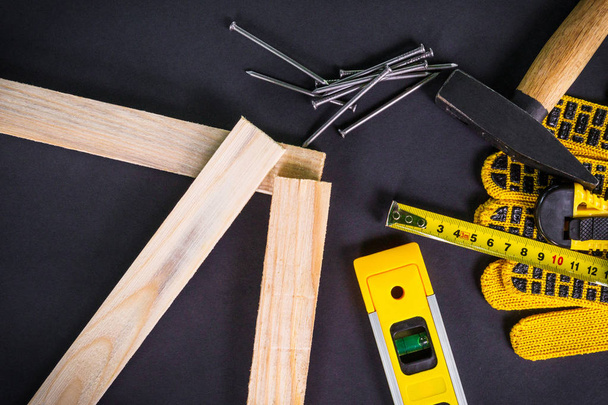 Professional tools for the joiner and spare parts on a black background. - 写真・画像