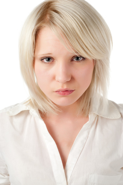 Beautiful blond teenage girl on white - Fotó, kép