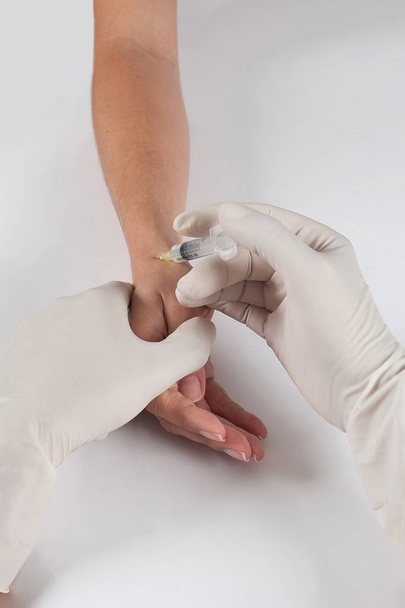 Hand intra articulaire injectie - Foto, afbeelding