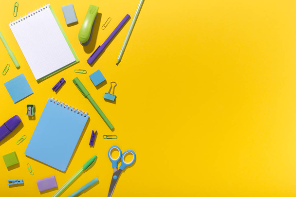 Modern office stationery for sale on yellow background - Photo, Image