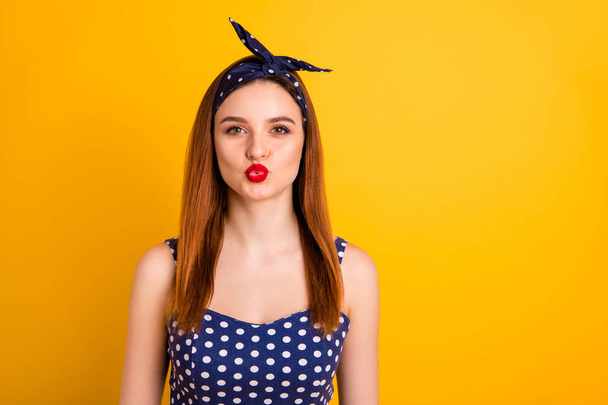 Photo of beautiful foxy lady red lipstick send air kiss wear casual dotted tank-top headband isolated vivid yellow background - 写真・画像