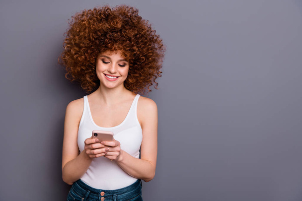 Close up photo of foxy lady hands telephone reader instagram post followers wear white tank-top isolated grey background - Photo, Image