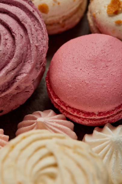 Delicious pink french macaron with soft zephyr and small pink meringues - Fotografie, Obrázek