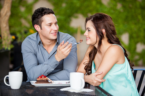 Man sharing cake with his date - Photo, Image