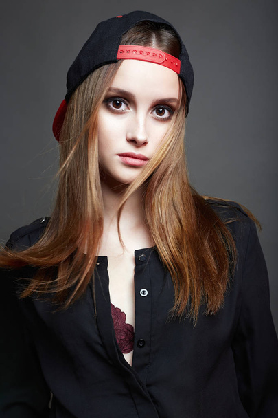 beautiful Girl in Cap. Teenager style.Healthy Hair - Фото, зображення