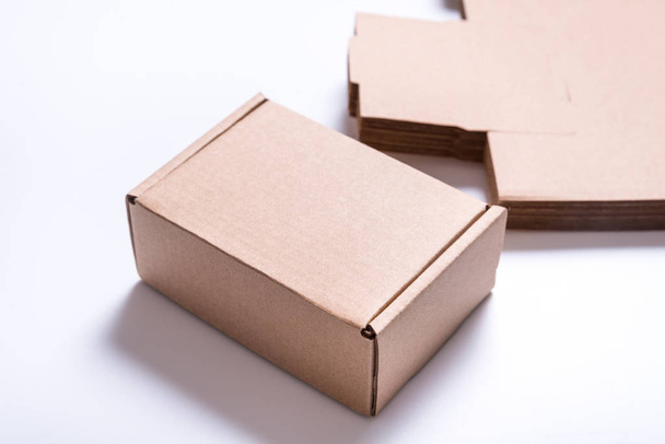 Craft brown carton Cardboard boxes on white background, industrial - Foto, Imagem